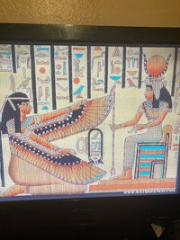 an egyptian painting on a tv